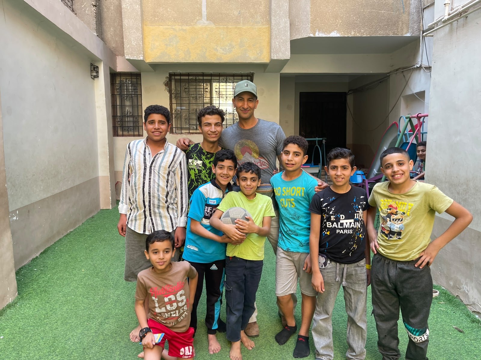 Dr. Michael Ghaly with the children of Rifka's House.
